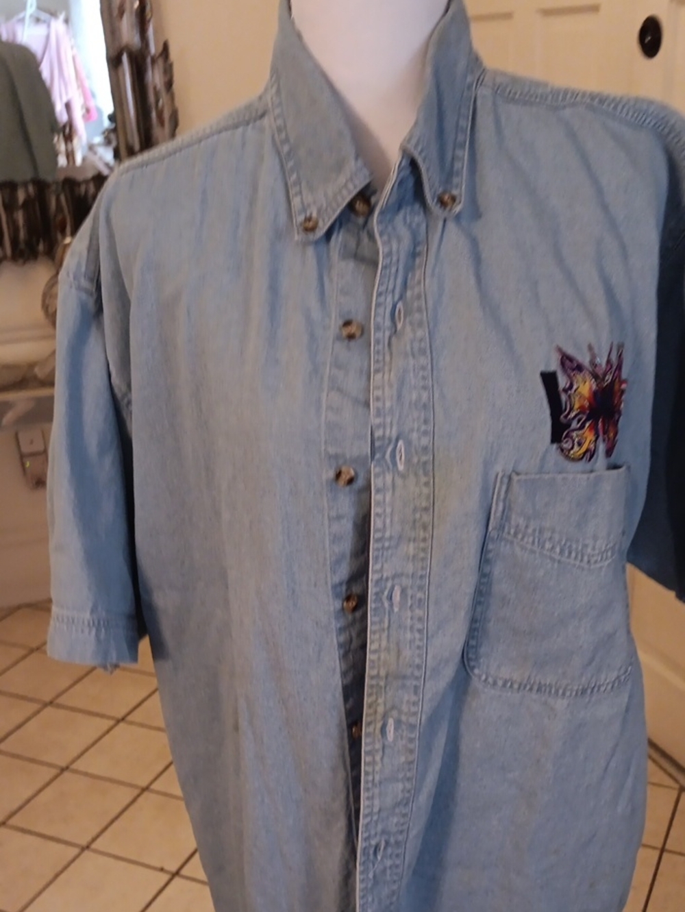 Light Blue Denim Short-Sleeve Button-Down Blouse with Embroidered Chest Detail